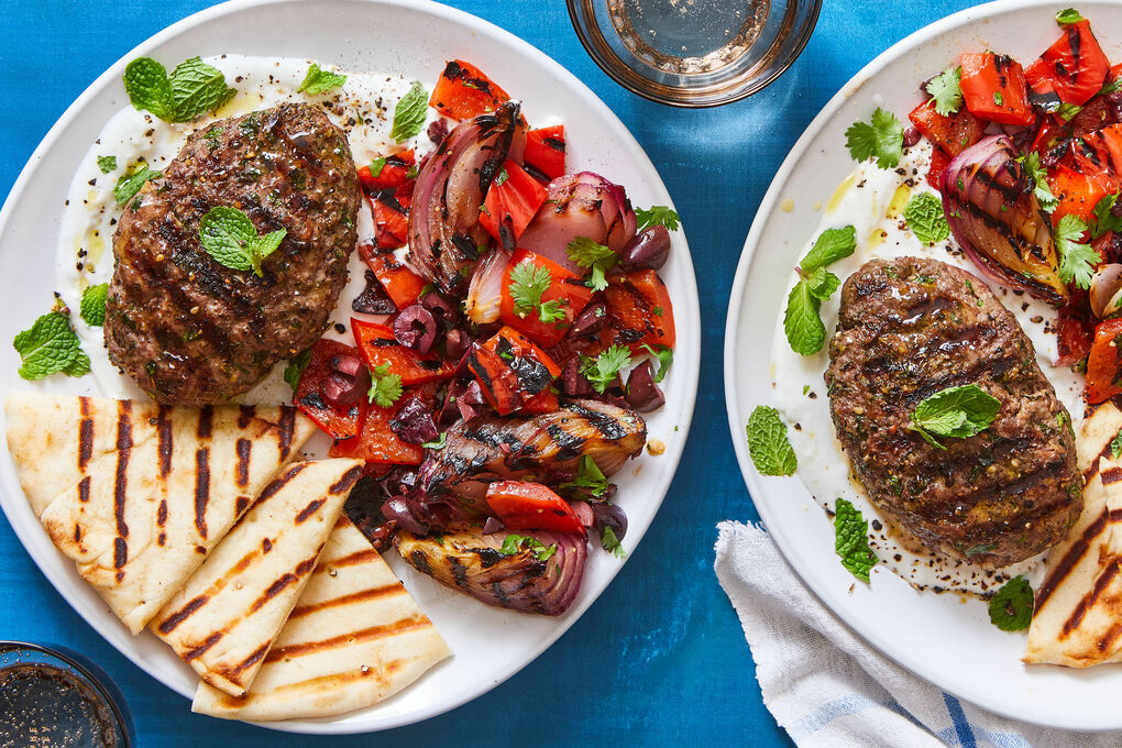 Levapioli grilled minced meat patties served with herbs, bread, and Mediterranean spices